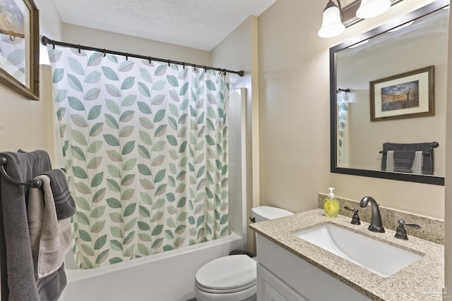 full bathroom with toilet, shower / tub combo, vanity, and a textured ceiling