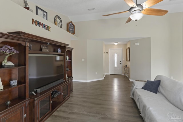 living room with high vaulted ceiling, dark wood-style flooring, baseboards, and a ceiling fan