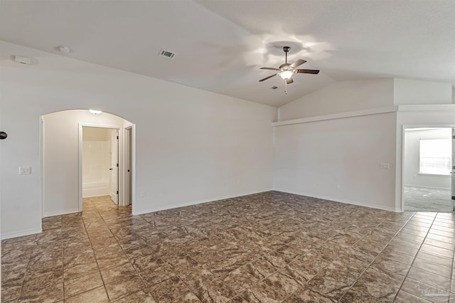 unfurnished room featuring ceiling fan and lofted ceiling