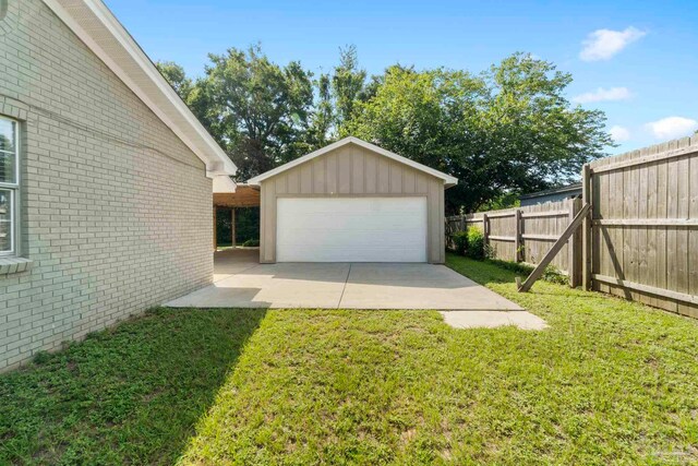 garage with a yard