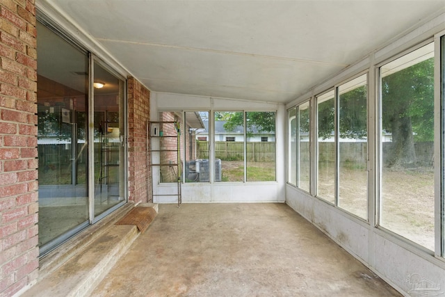 unfurnished sunroom with a wealth of natural light