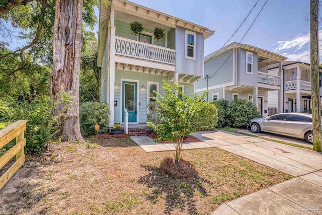 multi unit property featuring a balcony