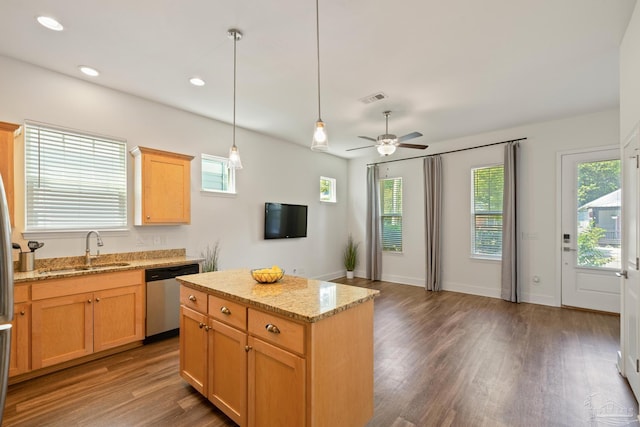 kitchen with a sink, dishwasher, wood finished floors, hanging light fixtures, and recessed lighting