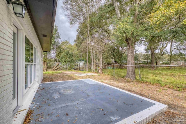 view of yard featuring a patio and a fenced backyard