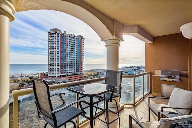 balcony featuring a water view