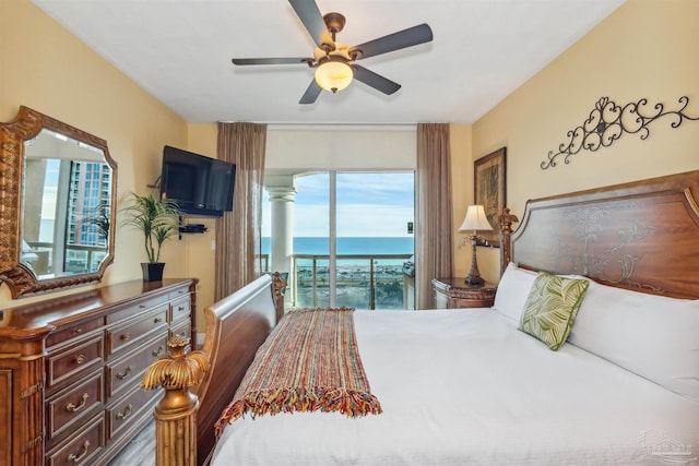 bedroom featuring access to exterior and ceiling fan