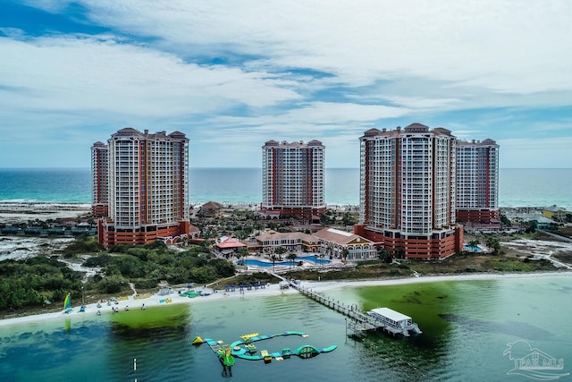 aerial view featuring a water view and a view of the beach