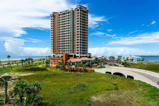 surrounding community featuring a water view