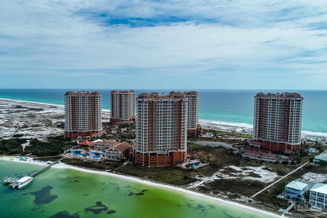 bird's eye view with a water view and a view of the beach