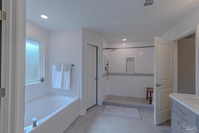 full bath featuring a walk in shower, visible vents, and tile patterned flooring
