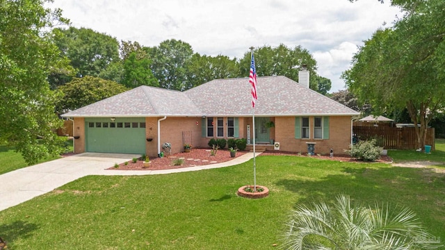 905 Shadow Ridge Dr, Pensacola, FL 32514 - single story home featuring a garage, a chimney, driveway, and brick siding