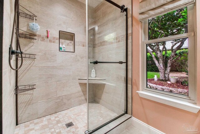 905 Shadow Ridge Dr, Pensacola, FL 32514 - full bathroom featuring a stall shower and baseboards