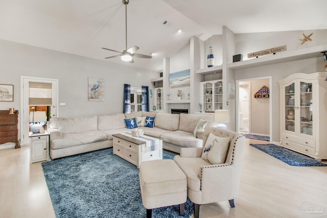 905 Shadow Ridge Dr, Pensacola, FL 32514 - living room with light wood-style floors, a ceiling fan, high vaulted ceiling, and a fireplace