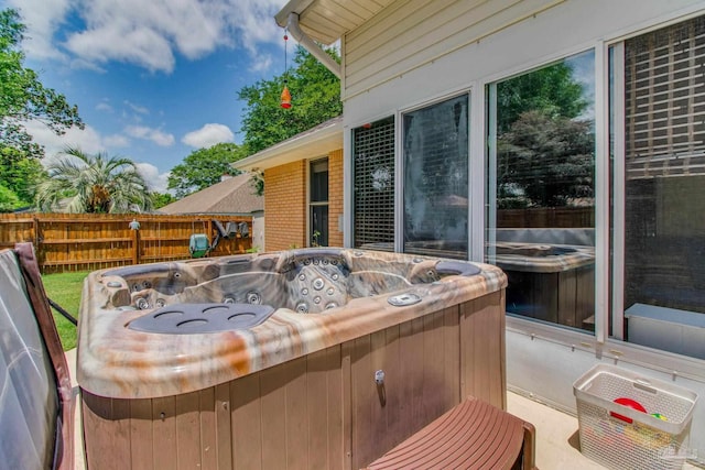 905 Shadow Ridge Dr, Pensacola, FL 32514 - view of patio / terrace with a hot tub and fence