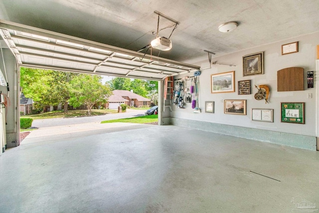 905 Shadow Ridge Dr, Pensacola, FL 32514 - garage featuring a garage door opener