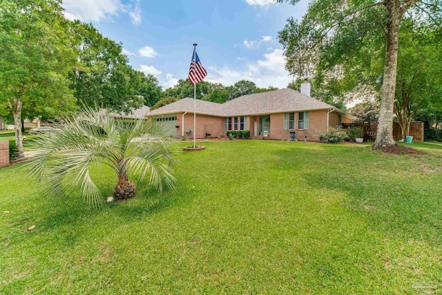 905 Shadow Ridge Dr, Pensacola, FL 32514 - single story home featuring a garage, a chimney, and brick siding