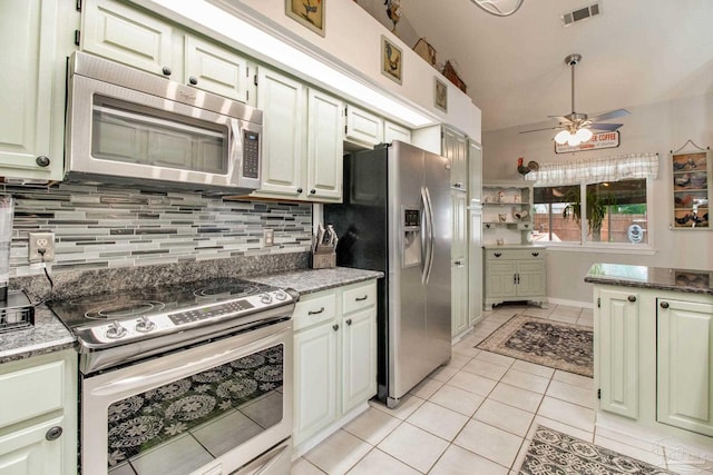 905 Shadow Ridge Dr, Pensacola, FL 32514 - kitchen with stainless steel appliances, light tile patterned floors, ceiling fan, decorative backsplash, and stone counters