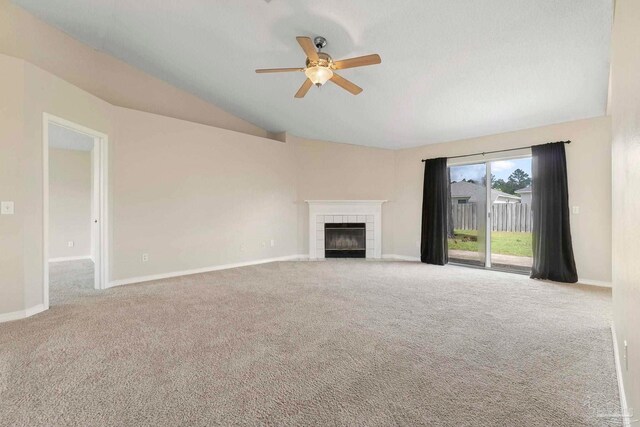 1978 Coral Reef Rd, Pensacola, FL 32506 - unfurnished living room with ceiling fan, carpet, a fireplace, baseboards, and vaulted ceiling