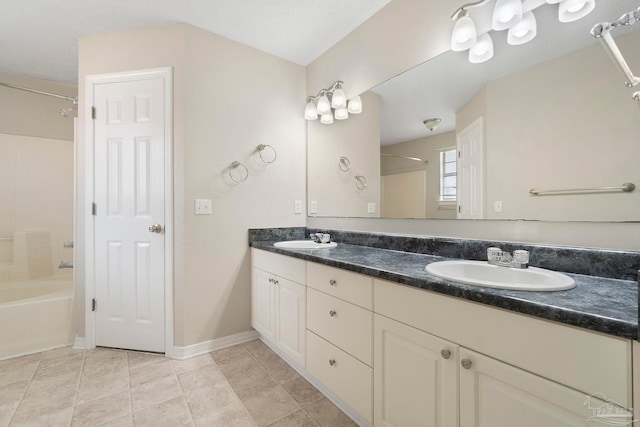 1978 Coral Reef Rd, Pensacola, FL 32506 - full bathroom with double vanity, shower / bathtub combination, and tile patterned flooring