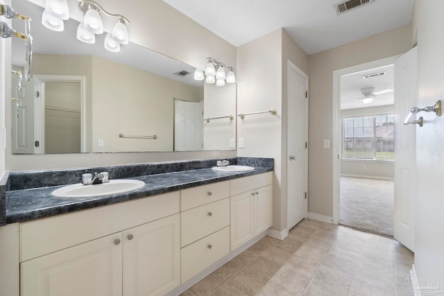 1978 Coral Reef Rd, Pensacola, FL 32506 - full bathroom featuring double vanity, baseboards, and a closet