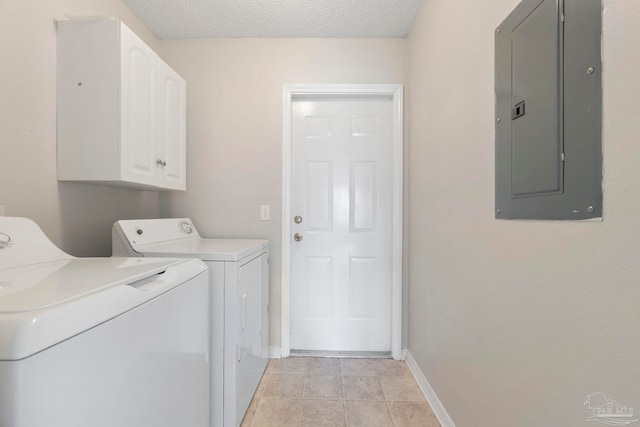 1978 Coral Reef Rd, Pensacola, FL 32506 - washroom with electric panel, washer and clothes dryer, cabinet space, baseboards, and a textured ceiling