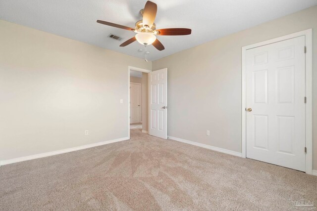 1978 Coral Reef Rd, Pensacola, FL 32506 - unfurnished bedroom featuring carpet floors, baseboards, and a ceiling fan
