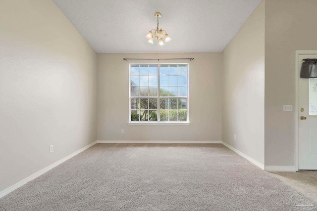 1978 Coral Reef Rd, Pensacola, FL 32506 - carpeted empty room with a chandelier and baseboards