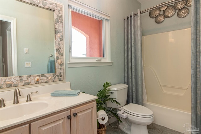 full bathroom with tile patterned floors, vanity, shower / bath combo, and toilet