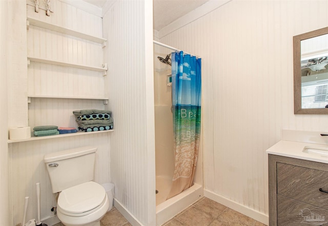 bathroom with tile patterned flooring, toilet, vanity, a shower with curtain, and ornamental molding