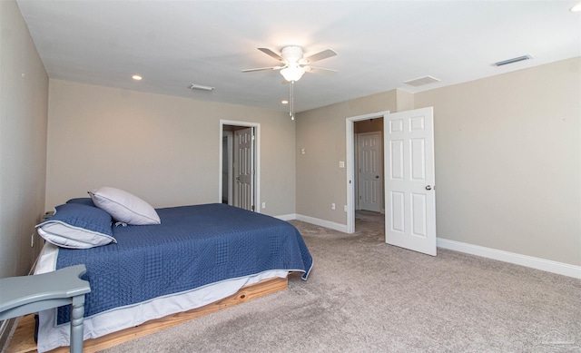 bedroom featuring carpet, visible vents, baseboards, and ceiling fan