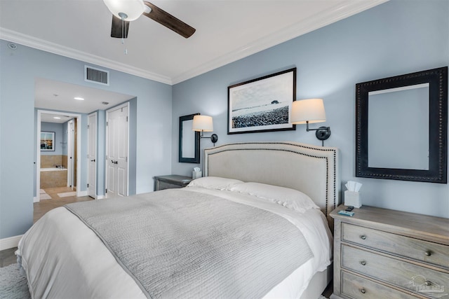 bedroom featuring ensuite bath, ornamental molding, and ceiling fan