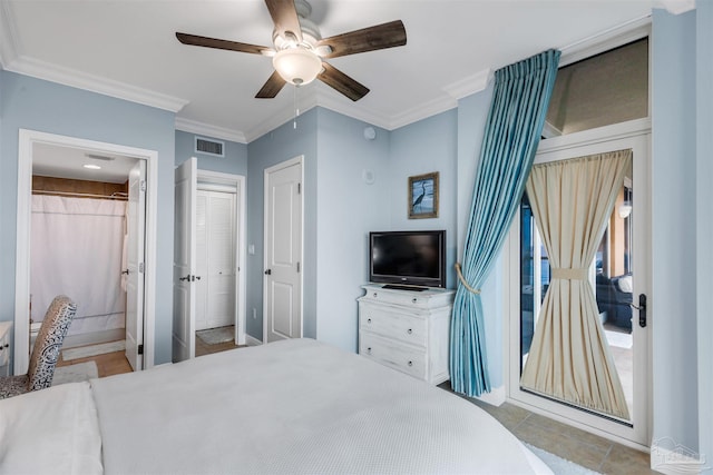 tiled bedroom featuring crown molding, ceiling fan, and ensuite bath