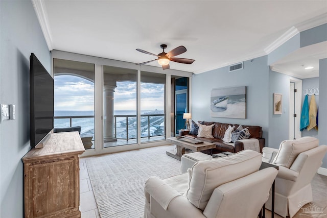 living room featuring light tile patterned floors, crown molding, floor to ceiling windows, and ceiling fan