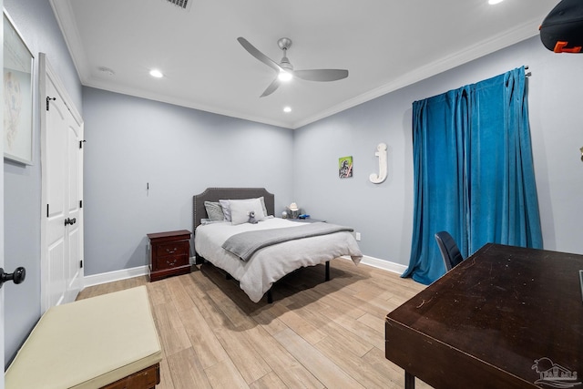 bedroom with crown molding, wood-type flooring, and ceiling fan