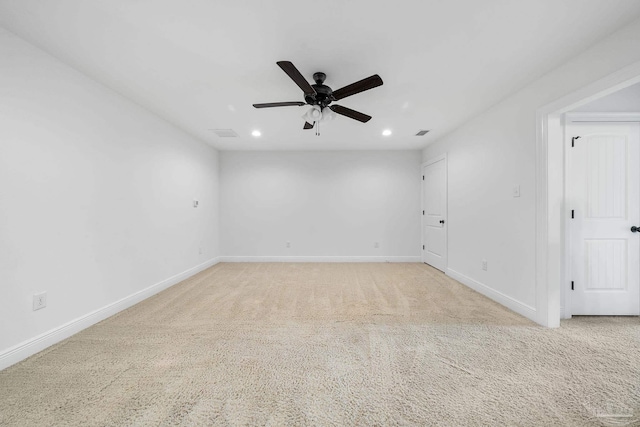 carpeted empty room with ceiling fan