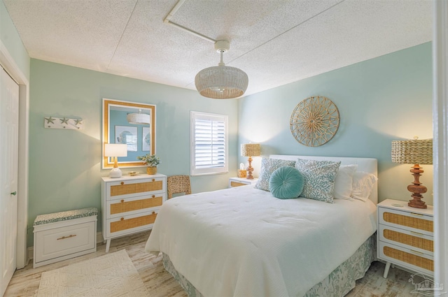 bedroom featuring a textured ceiling