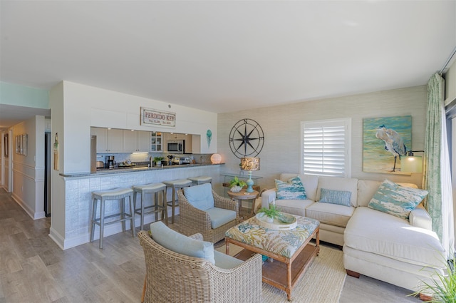 living room featuring light wood-type flooring