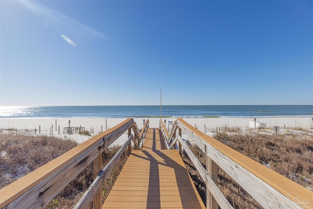 view of home's community with a view of the beach and a water view