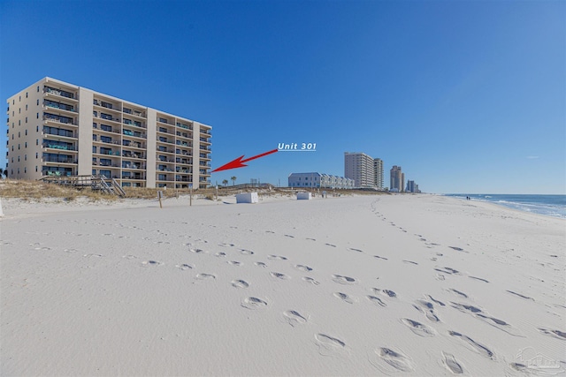 property view of water with a beach view