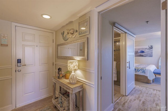 hallway featuring wood finished floors