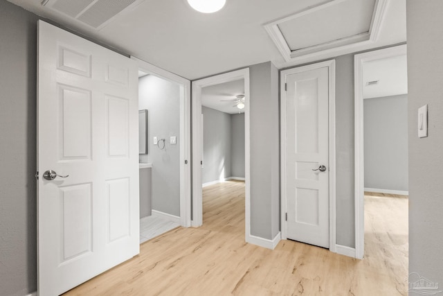 hallway with light wood-type flooring