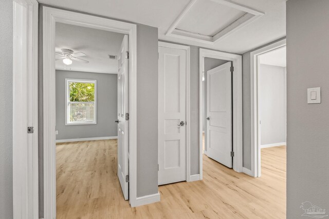 hallway featuring light hardwood / wood-style flooring