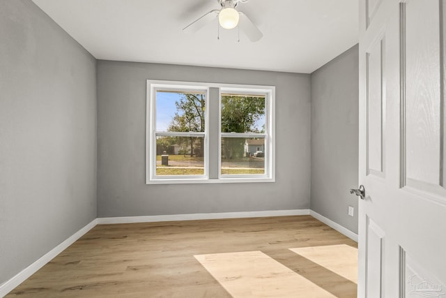 unfurnished room featuring ceiling fan and light hardwood / wood-style floors