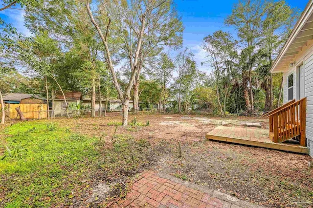 view of yard with a deck