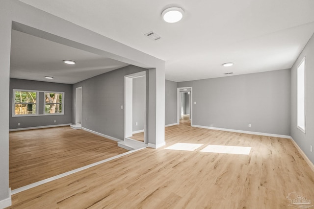 unfurnished room featuring light hardwood / wood-style flooring