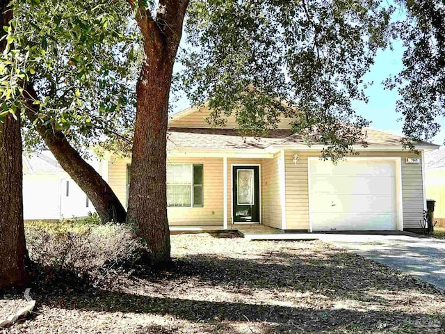 view of front of property featuring a garage