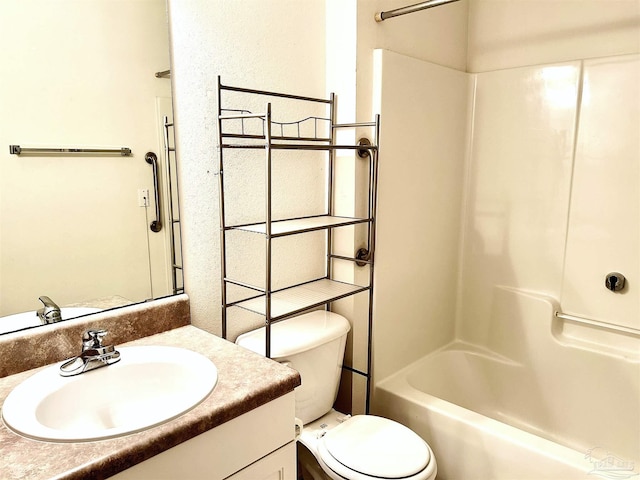 full bathroom with vanity, toilet, and shower / washtub combination