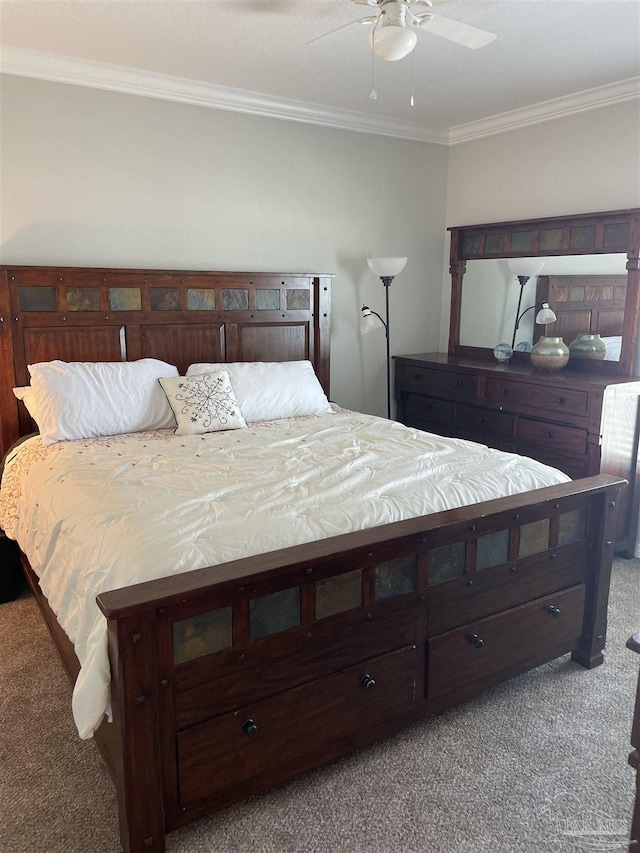 bedroom featuring crown molding, ceiling fan, and carpet floors