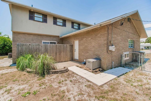 rear view of property with a patio