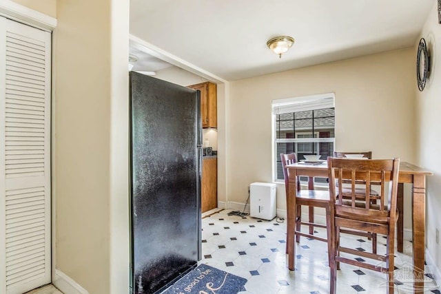 518 W Strong St Unit A & B, Pensacola, FL 32501 - dining space featuring baseboards and light floors
